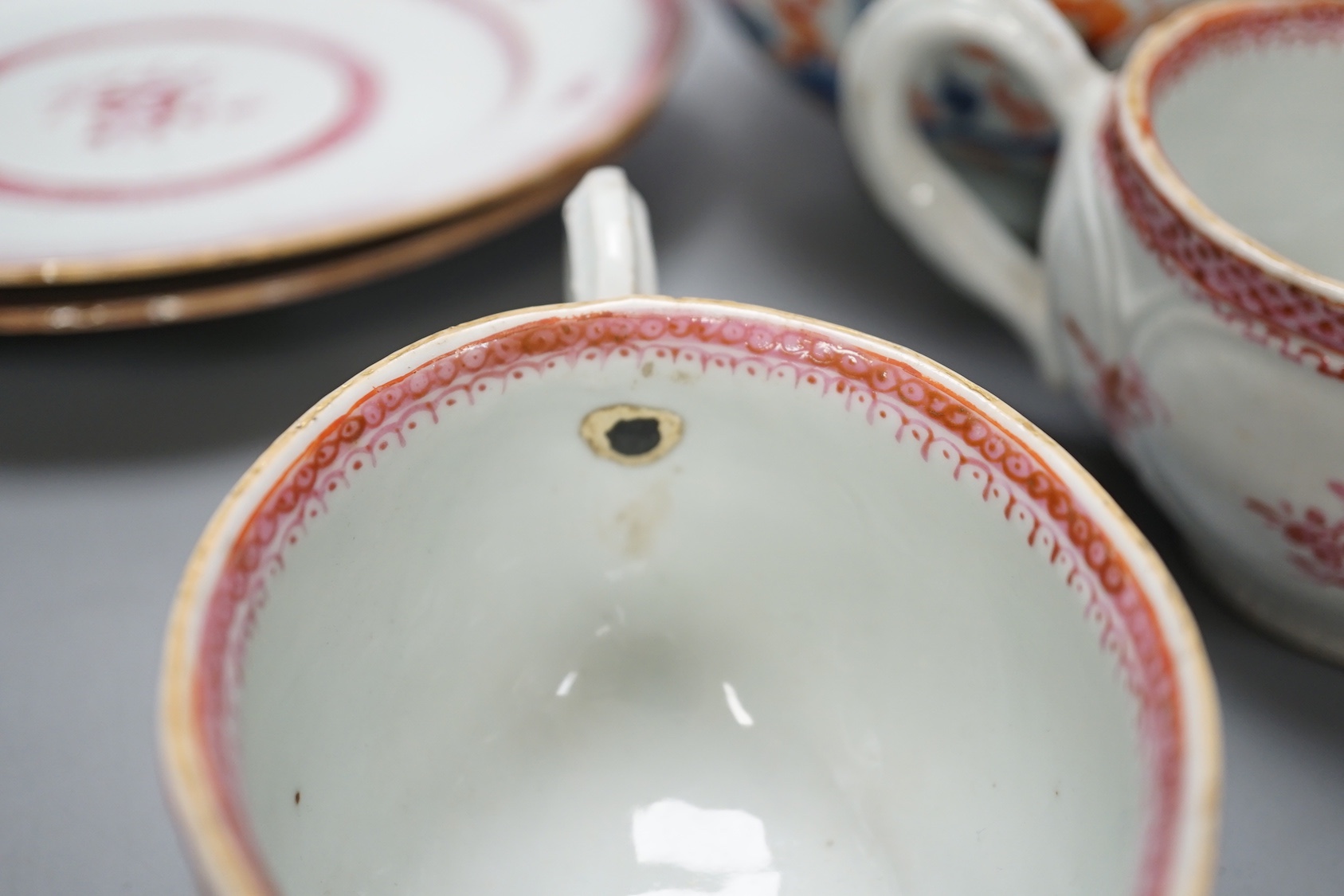 A group of 18th century chinese export: two plates, two sauceboats, a bowl and a tea bowl